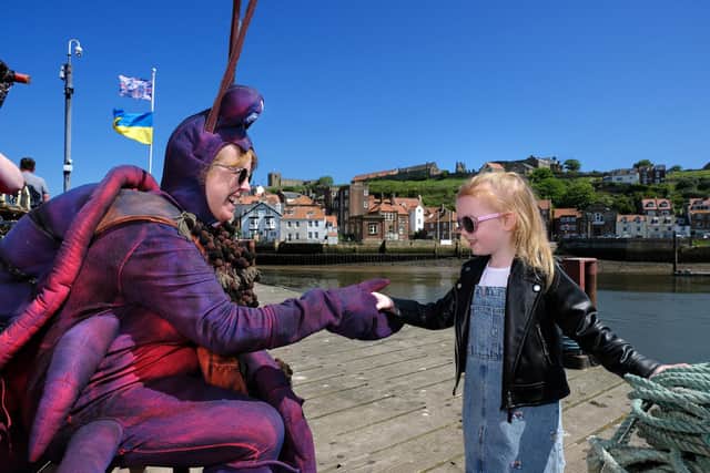 A youngster meets a giant lobster on Whitby quayside.
picture: Richard Ponter