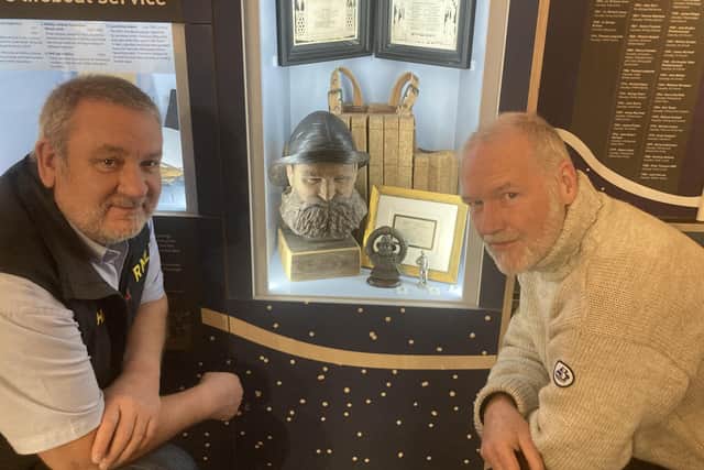 Whitby RNLI Coxswain Howard Fields with ceramicist Rik Berry at the Lifeboat Museum.
picture: RNLI/Ceri Oakes