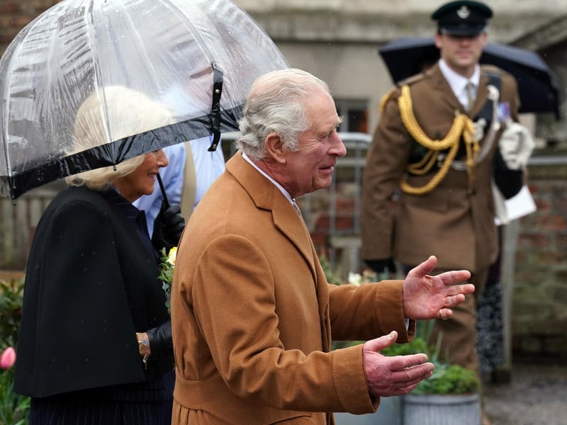 King Charles III talks to the crowd.