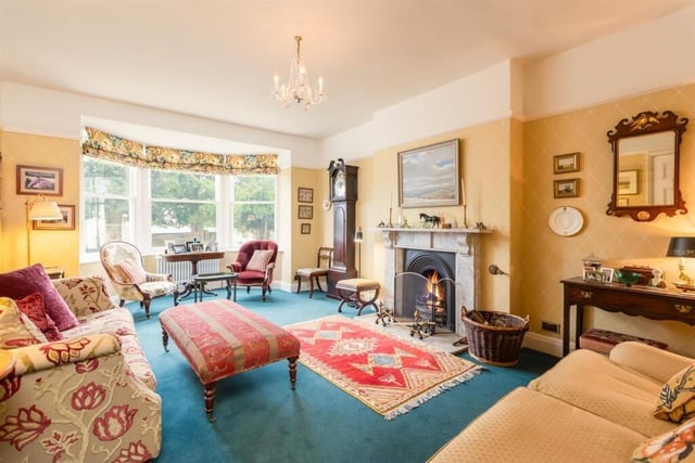 A lovely bay-fronted lounge with feature fireplace.