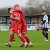 Sam Leverett is congratulated after one of his two goals in the 3-2 loss at Ashington on Saturday afternoon. PHOTO BY TCF PHOTOGRAPHY