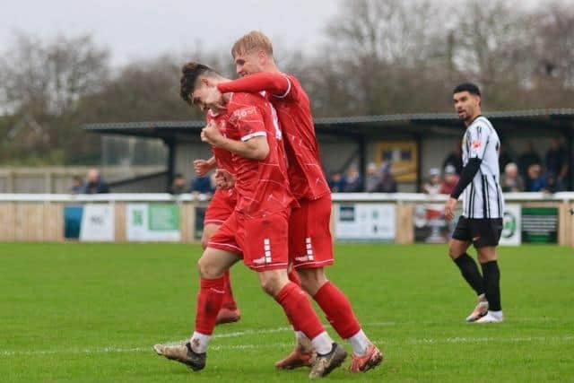 Sam Leverett is congratulated after one of his two goals in the 3-2 loss at Ashington on Saturday afternoon. PHOTO BY TCF PHOTOGRAPHY