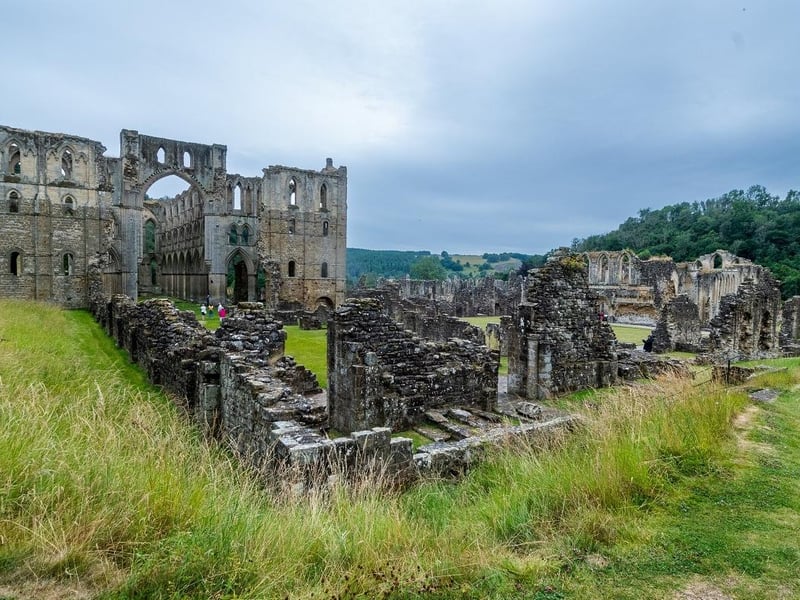 This abbey was a Cistercian in Rievaulx near Helmsley, in the North York Moors National Park and was one of the great abbeys in England until its dissolution in 1538 under Henry VIII. It was the first Cistercian monastery in the north of England, established in 1132 by 12 monks from Clairvaux Abbey. The site was awarded Scheduled Ancient Monument status in 1915 and the abbey was brought into the care of the then Ministry of Works in 1917.