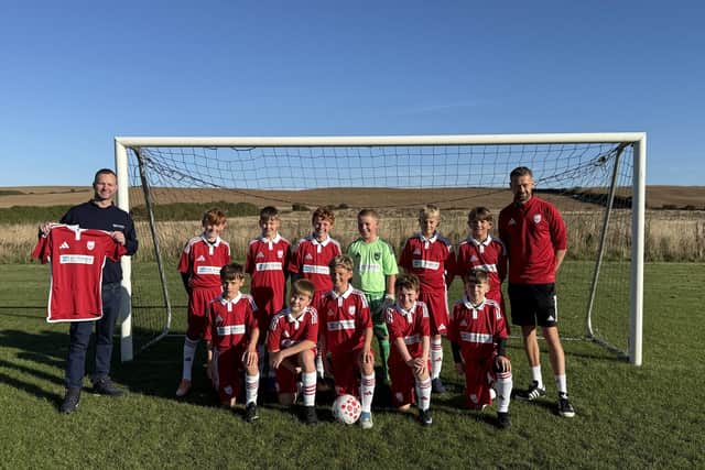 Boro U12s showing off their home kit sponsored by Lee Howard - Plumbing & Heating Engineer Ltd.