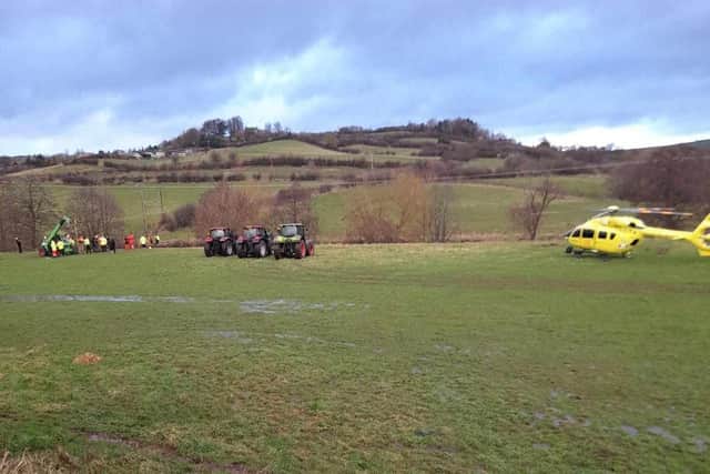 Emergency service personnel assess the scene. Image courtesy: Colin Featherstone