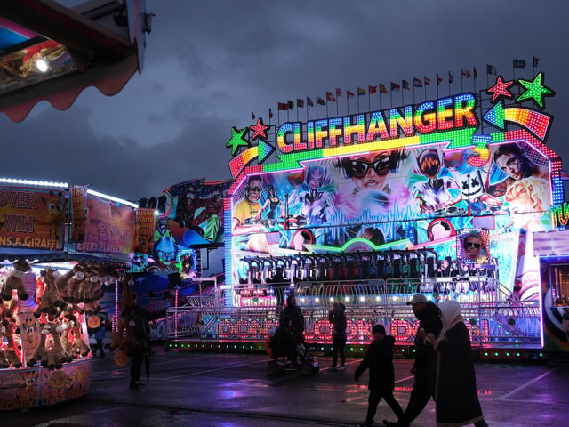 The iconic fair lights sparkling in the autumn evening.