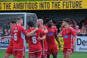 Mulhern celebrates his second goal making it 3-0 at the break.