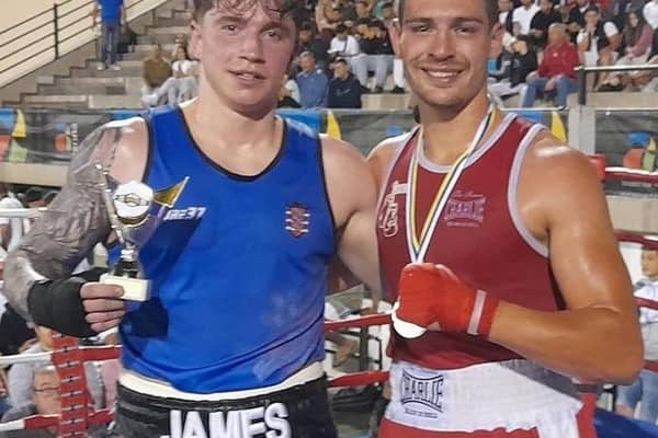 Bridlington's James Precious shows off his trophy after winning his fight in Tenerife.