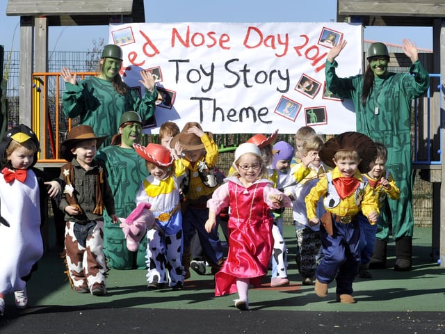 Red Nose Day runaround as children and staff dressed as Toy Story characters, at Happy Jays nursery, Eastfield.  111179d  pic by Andrew Higgins