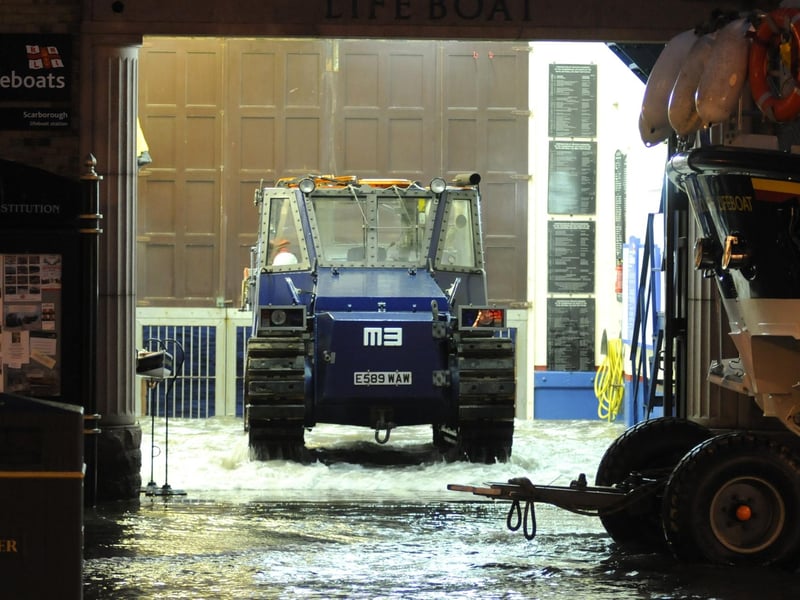 Seawater surging through the lifeboat house.