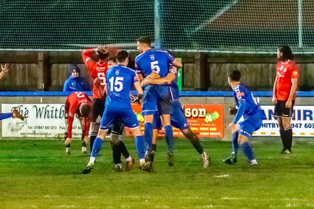 Whitby Town celebrate their last-gasp leveller scored by Daniel Rowe against NPL Premier Division high-flyers Hyde United PHOTOS BY BRIAN MURFIELD