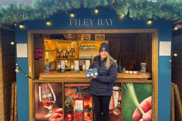 Libby Arnell with the Filey Bay Preserves Set at York Christmas Market