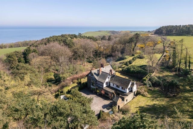 An overview of the property within its seven acres of gardens, and wider stunning surroundings.