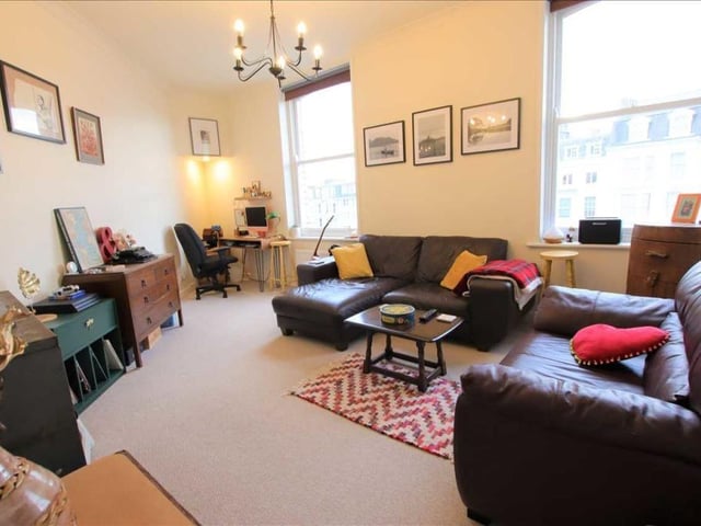 The living room faces south-west and has views over the sea.