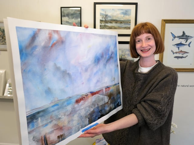 Lucy Somper with one of her art pieces.