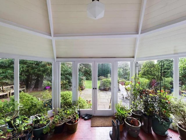 The sun room is currently home to the owners plants.