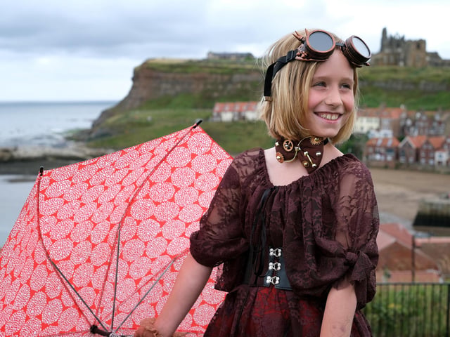 Arabella Smith avoiding the raindrops.
picture: Richard Ponter.
