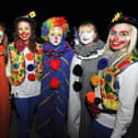 Fundraisers dress up as clowns for Saint Catherine's Hospice Midnight Walk.