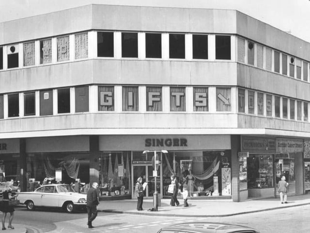 The Singer shop, on the corner of Aberdeen Walk. Above was Scene One and Two, and to the right Pickwicks gifts and toys, Eastern Carpet Stores and Dolcis shoe shop.