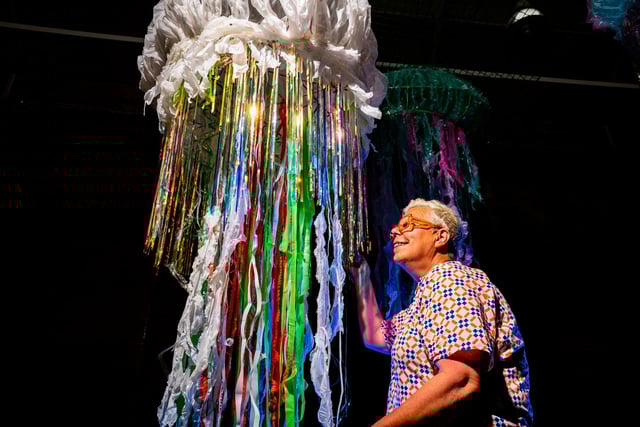 Bobby Hick, one of the six artists helping with the installation of artwork ahead of the opening.
