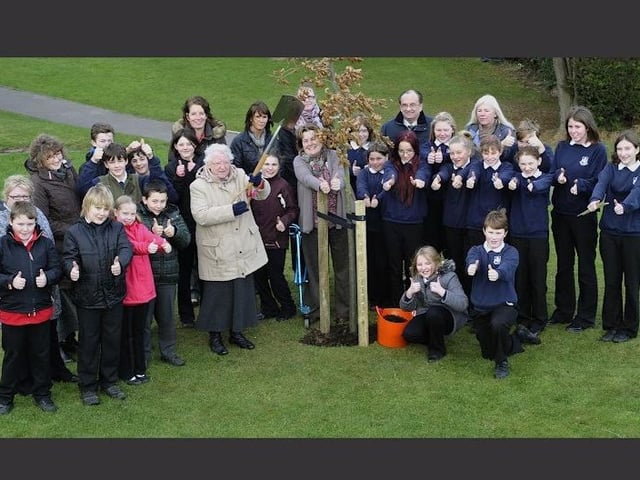 Eskdale School 60th anniversary Sheila Hood, an original school member, at a tree planting as school staff, ex-pupils and teachers look on.
Picture Richard Ponter, 135132