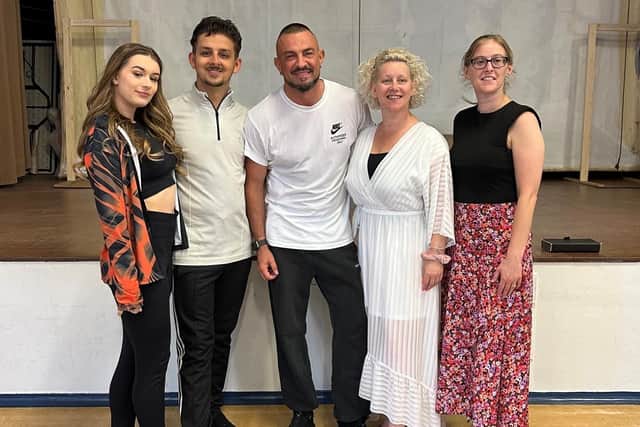 Robin Windsor poses with teachers from Colebrooke Productions.