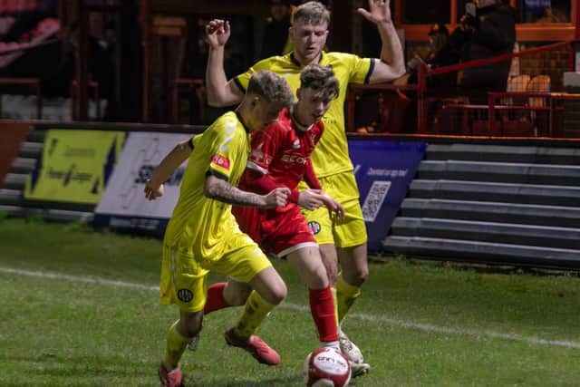 Bridlington Town, red kit, battle it out with Heaton Stannington. Photo by Rhys O'Callaghan