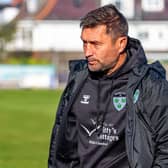 Graeme Lee takes in the action during his first game in charge of Whitby, a goalless draw at home to Bamber Bridge. Photo by Brian Murfield