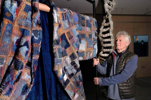 Rob Moore prepares for a new the exhibition at the Old Parcels Office at Scarborough Railway Station