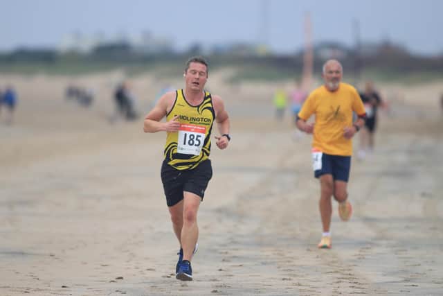 Bridlington Road Runner Nick Craggs in action at the Bridlington South Beach 5K race on Sunday morning. PHOTOS BY TCF PHOTOGRAPHY
