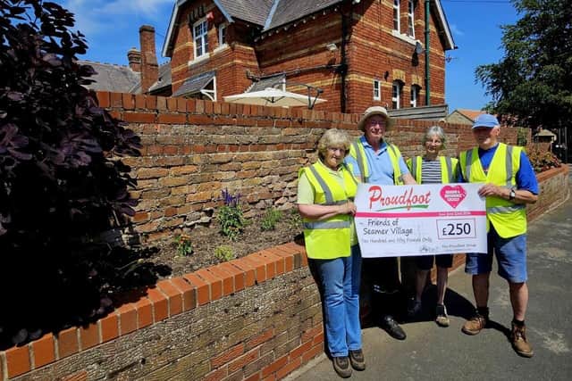 Friends of Seamer Village with their cheque