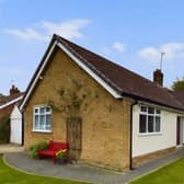 A view of the detached bungalow exterior.