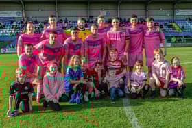 Whitby Town line up before their 0-0 draw with Leek Town in their pink kit. PHOTO BY BRIAN MURFIELD