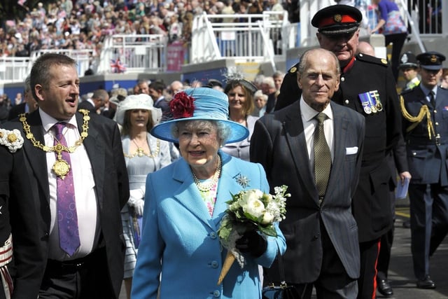 Cllr Bill chatt(L) the Mayor of Scarborough, walks with the Queen and Prince Phillip at the Opening of the Open Air Theatre
