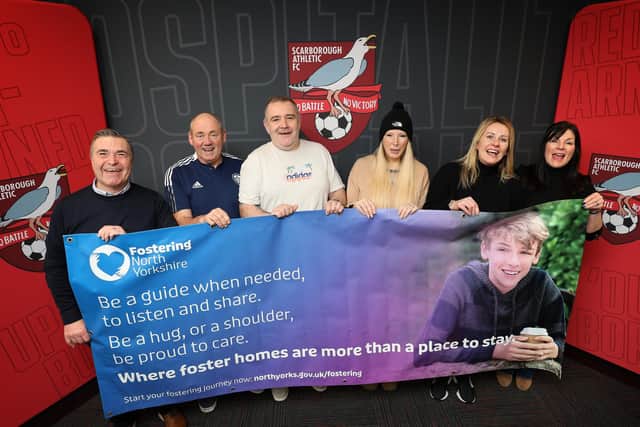 Scarborough Athletic FC is offering a boost to children in care, care leavers and foster carers. Pictured from left to right: community engagement officer at the Scarborough Athletic Community Trust Steve Machen, Scarborough foster carers Paul Blacker, Chris and Sarah Foster and Portia Staveley, North Yorkshire Council’s assistant director for children and families, Mel Hutchinson.