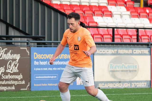 Man of the match Joel Ramm on the attack for the winners Edgehill.