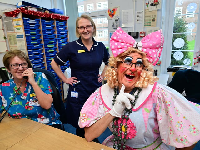 The Dame ready to help on reception