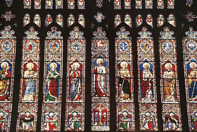 The Great West Window is viewed at its best during a summer’s evening. Postcard courtesy of Aled Jones