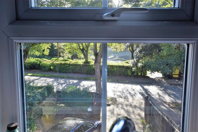 Looking out from a window within the property to leafy Peasholme Park