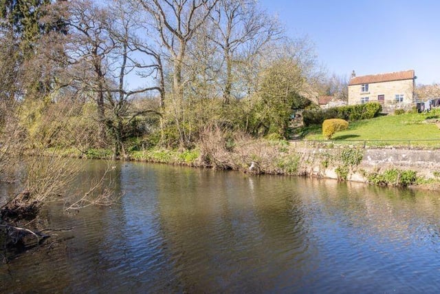 The picturesque property has views over the river in the village of Egton Bridge.