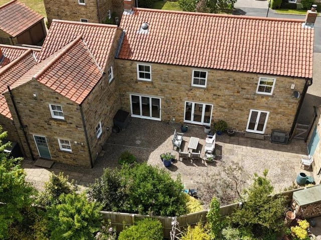 An aerial view of the property and its seating area.
