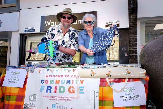 Chris and Ruth Fairchild work on the Community Fridge stall