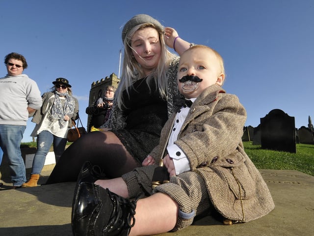 Mum Morgan and baby Archie enjoy the day. 144430f