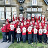 Youngsters at Egton School, near Whitby, celebrate an A+ SIAMS inspection.