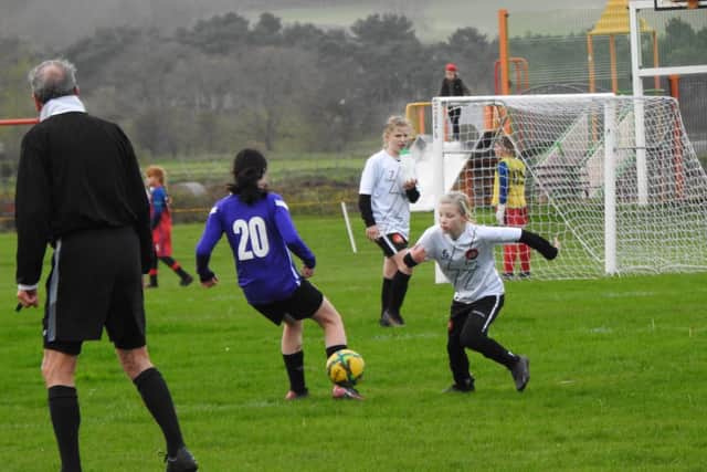 Scarborough Ladies UNder-12s Whites in action against Bishopthorpe