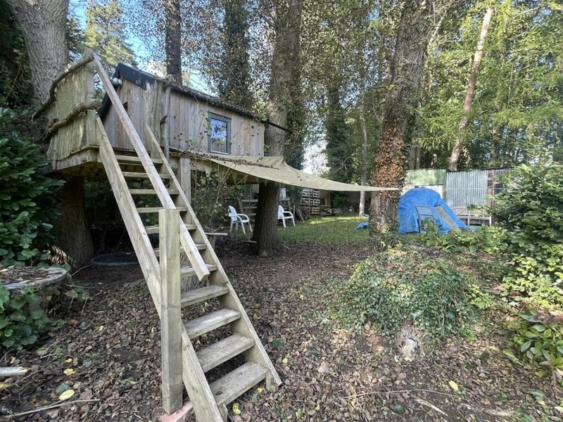 The gardens include woodland and added facilities.