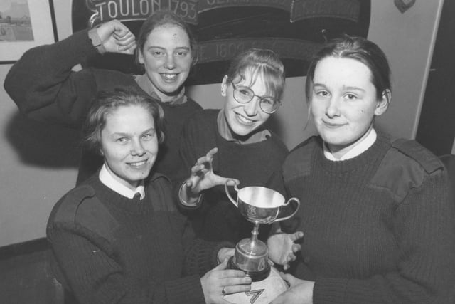 Cadets from Scarborough's sea cadet unit, TS Unseen, scored their way to the finals of a five-a-side football tournament in February, 1997. Pictured are four members of the team with their trophy. From left, Susan Simpson, Alex Bell, goalkeeper Donna Walker, and captain Natalie Cooper who also won player of the tournament. Hayley Surry, fifth player not pictured. 