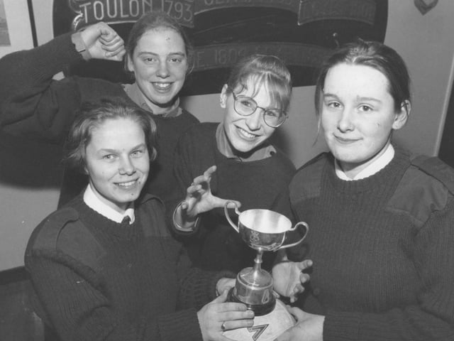 Cadets from Scarborough's sea cadet unit, TS Unseen, scored their way to the finals of a five-a-side football tournament in February, 1997. Pictured are four members of the team with their trophy. From left, Susan Simpson, Alex Bell, goalkeeper Donna Walker, and captain Natalie Cooper who also won player of the tournament. Hayley Surry, fifth player not pictured. 