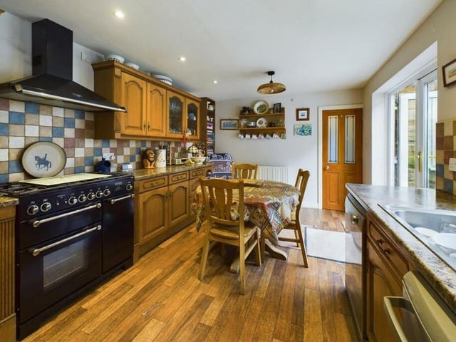 The kitchen and diner has double doors leading out to the gardens.