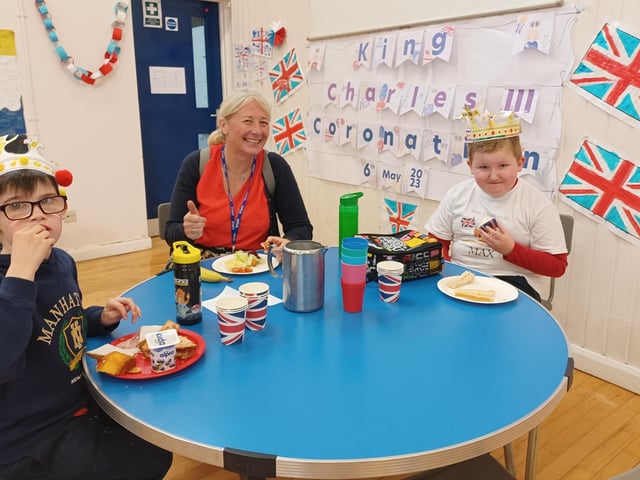 Children dressed up and wore crowns at Woodlands Academy